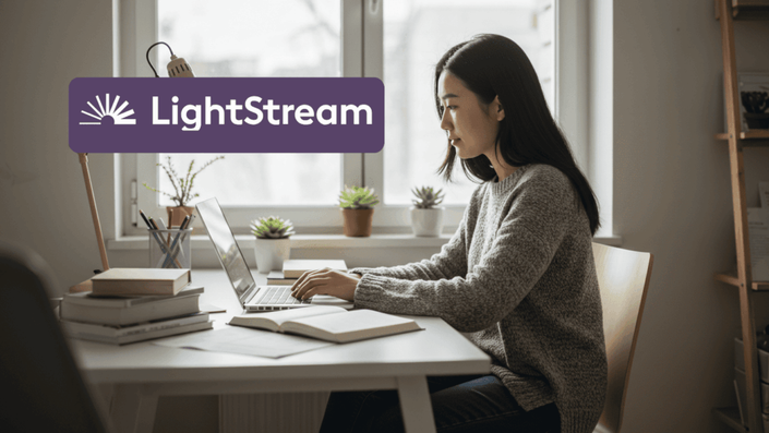 A young woman is working on a laptop at a desk filled with books and plants, in a cozy, well-lit room. The LightStream logo is digitally overlaid in the top left corner.
